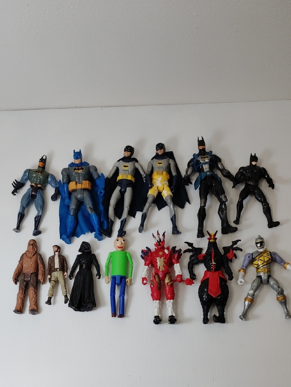 Batman Action Figure Set with Blue, Black, Gray and Yellow Figures